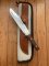 Puma Knife: 1987 Puma Big Big Bowie knife with Wooden Handle in original Tan Leather Sheath & Case