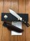 Puma Knife: Puma 2006 Rare Model Amicus with Black Handle and Display Box