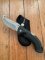 Buck Knife: 2007 Model 398 Large Buck OMNI Hunter Folding Gut Hook Knife with Black Handle & Pouch
