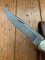 Buck Knife: 1989 Model Buck 110 Classic with Aged Stag Handle and Damascus Blade and Leather Pouch