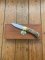 Puma Knife: Puma Original Scrimshawed Puma Aligator 4 Star Folding Lock Blade Knife with Presentation Box