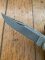 Buck Knife: 1989 Model Buck 110 Classic with Aged Stag Handle and Damascus Blade and Leather Pouch