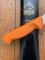 Puma Knife: PUMA German Made boning knife, Bent,  semi-flex, 13 cm Blade with Orange Handle