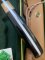 Puma Knife: Puma Original 1992 4 Star Fixed Blade Knife with Black Ebony Handle in Original Green and Yellow Box #26291