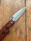 Buck Knife: 2006 Buck 170 Red Lightning Single Blade Pocket Knife With Red Handle