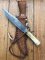 Damascus Knife: Damascus Knife with Jigged Camel Bone Handle &Custom Made Sheath