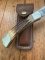 Buck Knife: 1989 Model Buck 110 Classic with Aged Stag Handle and Damascus Blade and Leather Pouch