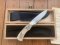 Puma Knife: Puma 1990 American Wildlife Collection 4 star Fixed Blade Knife with White Micarta Handle Original Box and matching Warranty #025/400