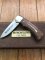 Puma Knife: Puma Original Winchester 1894 Rifle 4 Star Folding Lock Blade Knife with Wooden Presentation Box 1 of 1894