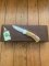 Puma Knife: Puma Original Scrimshawed Puma Roe Deer 4 Star Folding Lock Blade Knife with Presentation Box