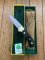 Puma Knife: Puma Original 1992 4 Star Fixed Blade Knife with Black Ebony Handle in Original Green and Yellow Box #26291