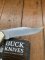 Buck Knife: Buck 1988 Model 110 Hunter Folding Lock Knife with Leather Pouch and Original Box