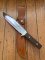 Puma Knife: 1989 Puma Big Big Bowie knife with Wooden Handle in original Tan Leather Sheath