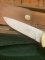 Puma Knife: Puma Original 1980's-90's 4 Star Fixed Blade Knife with Black Micarta Handle-Tan Sheath in Original Wooden Box