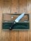 Puma Knife: Puma Original 1980's-90's 4 Star Fixed Blade Knife with Black Micarta Handle-Tan Sheath in Original Wooden Box