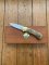 Puma Knife: Puma Original Scrimshawed Puma Aligator 4 Star Folding Lock Blade Knife with Presentation Box
