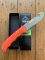 Puma Knife: Puma IP Pathfinder with gut hook, Orange Micarta Handle