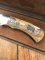 Puma Knife: Puma 1987 Original Scrimshawed 4 Star Folding Lock Blade Knife with Cape buffalo in Presentation Box