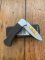 Puma Knife: 2004 Puma 4 Star Mini Folding Lock Knife with Black Buffalo Horn Handle