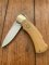 Puma Knife: Puma Original 1985 4 Star Folding Lock Blade Knife with Orange Ivory Micarta Handle