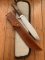 Puma Knife: 1987 Puma Big Big Bowie knife with Wooden Handle in original Tan Leather Sheath & Case