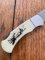 Puma Knife: Puma 4 Star Mini Folding Lock Knife with Scrimshaw Style White Tail Deer Handle