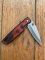 Buck Knife: 2006 Buck 170 Red Lightning Single Blade Pocket Knife With Red Handle