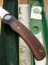 Puma Knife: Puma 1988 model 777 Sport Folding Knife with Walnut Handle Original Box and matching Warranty