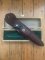 Puma Knife: Puma Original 1979 4 Star Fixed Blade Knife with Black Ebony Layered Handle in Original Wooden Box #13971