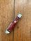 Puma Knife: Puma 2004 Trapper Lockback Knife with Red Smooth Bone Handle