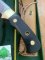 Puma Knife: Puma Original 1992 4 Star Fixed Blade Knife with Black Ebony Handle in Original Green and Yellow Box #26291