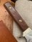 Puma Knife: 1987 Puma Big Big Bowie knife with Wooden Handle in original Tan Leather Sheath & Case