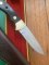 Puma Knife: Puma Original 1985 4 Star Fixed Blade Knife with Black Micarta Handle in Dark Brown Puma Sheath & Box