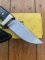 Buck Knife: Buck GEN 5 Skinner with Charcoal Laminated Handle and Sheath