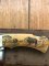 Puma Knife: Puma 1987 Original Scrimshawed 4 Star Folding Lock Blade Knife with Cape buffalo in Presentation Box