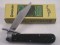 Schrade SCCS2010 Cutlery Collectors Society swing guard button lock folding knife.