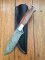SOSDF Knife: 200 Layer Damascus Salmon Coloured Camel Bone Handled Upswept Skinning Knife