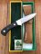 Puma Knife: Puma Original 1986 4 Star Fixed Blade Knife with Black Buffalo Handle in Original Green and Yellow Box