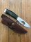 Buck Knife: Buck Rare 192 Ducks Unlimited Vanguard Knife with Hunter & Dog Cut Out