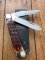 Puma Knife: Puma Large Trapper Lockback Knife with Jigged Red Bone Handle