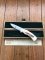 Puma Knife: Puma Original Scrimshawed Puma Mountain Lion 4 Star Folding Lock Blade Knife with Presentation Box