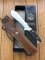 Puma Knife: Puma Rare Original 2001 Dark Stag New Hunter Model 118375 in original sheath and box.