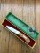 Puma Knife: Puma Original 1980 4 Star Folding Lock Blade Knife with Dark Orange Ivory Micarta Handle in Original Box & Warranty