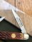 Puma Knife: Puma Bantam Folding Knife with Red Bone Handle Circa early 1990's