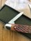 Puma Knife: Puma Bantam Folding Knife with Red Bone Handle Circa early 1990's