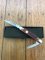 Puma Knife: Puma Bantam Folding Knife with Red Bone Handle Circa early 1990's